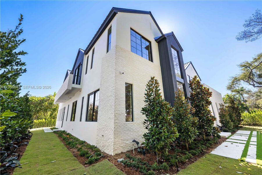 Front exterior of a new home in , Miami, FL, highlighting curb appeal (Image 18). Front exterior of a new home in , Miami, FL, highlighting curb appeal (Image 18).