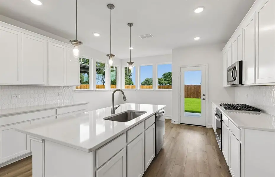 *Floorplan representation, not actual home - Dining area off kitchen with large windows