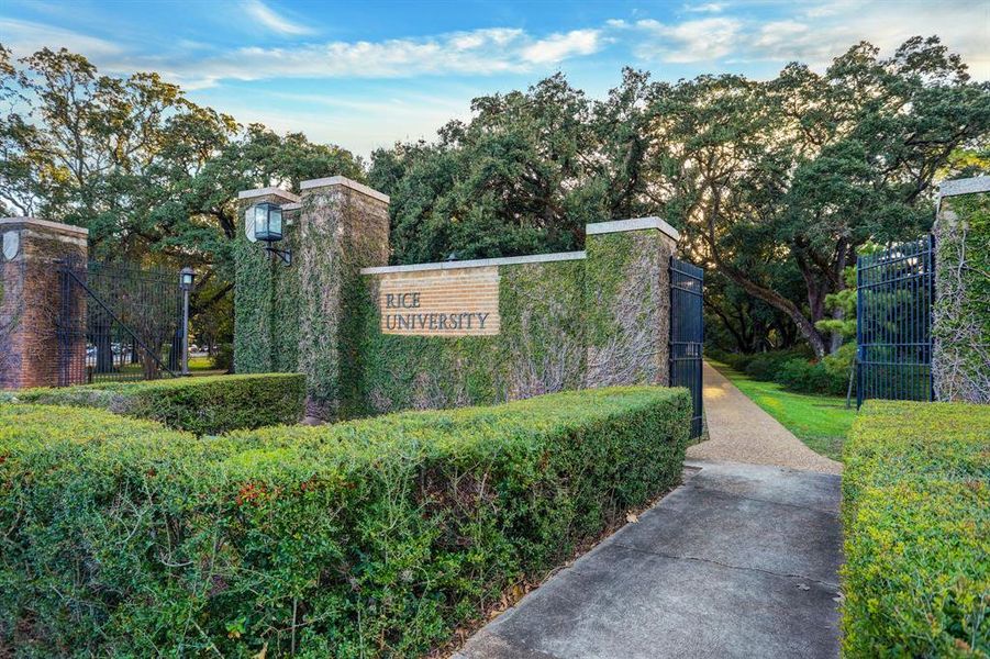 This is the entrance to a prestigious university, surrounded by lush greenery and well-maintained hedges, offering a serene and scholarly environment. It might appeal to home buyers looking for a property in an educated and tranquil neighborhood.