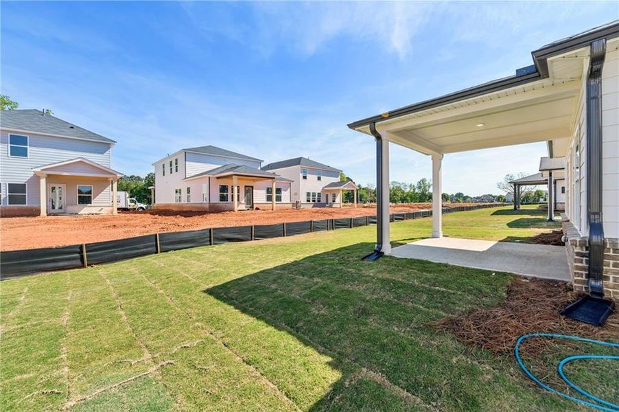 Exterior details and patio area of a home in Martin Springs - Reserve Series, Lawrenceville (Image 29).