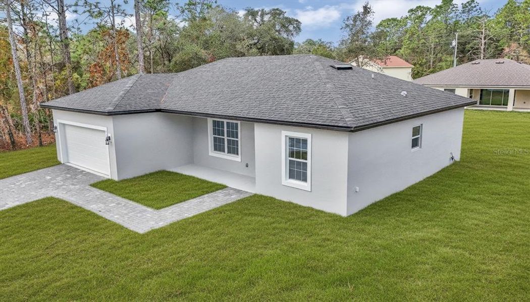 Exterior details and patio area of a home in , Citrus Springs (Image 16). Exterior details and patio area of a home in , Citrus Springs (Image 16).
