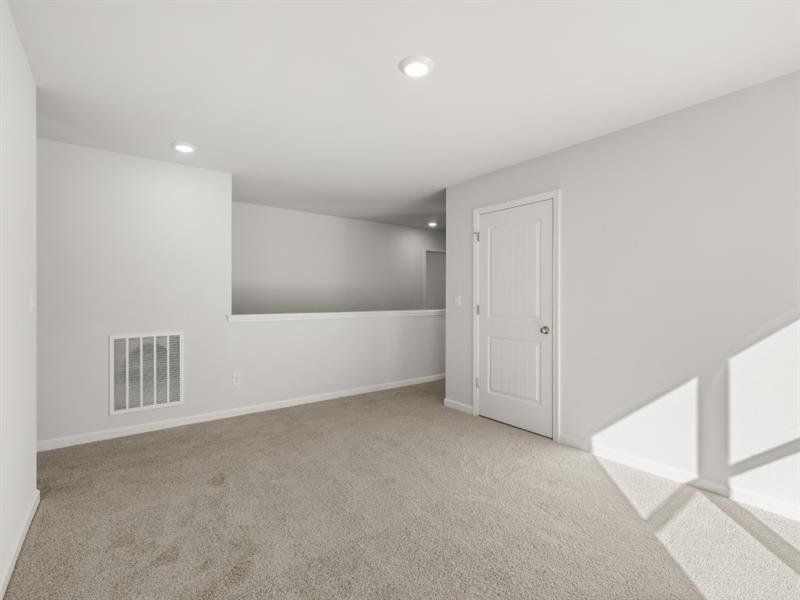 Spacious, unfurnished interior of a new home in Hamptons at Riverwood South, Dallas (Image 22).