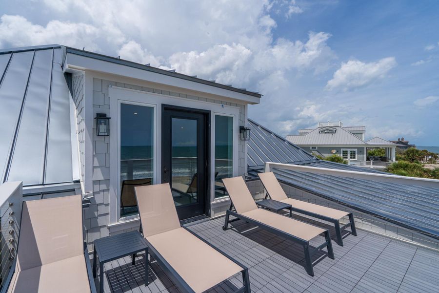 Exterior details and patio area of a home in , Edisto Island (Image 28).