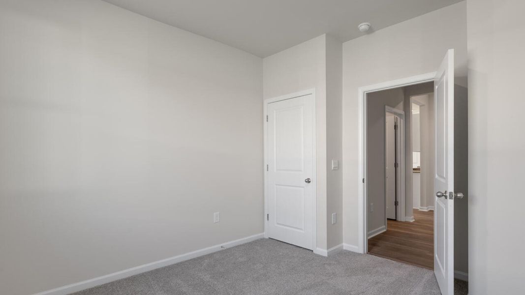 Spacious, unfurnished interior of a new home in Grayson Park, Leland (Image 18). Spacious, unfurnished interior of a new home in Grayson Park, Leland (Image 18).