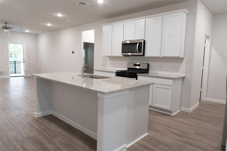Furnished interior view inside a new home in Lakes at Black Oak, Magnolia (Image 8).