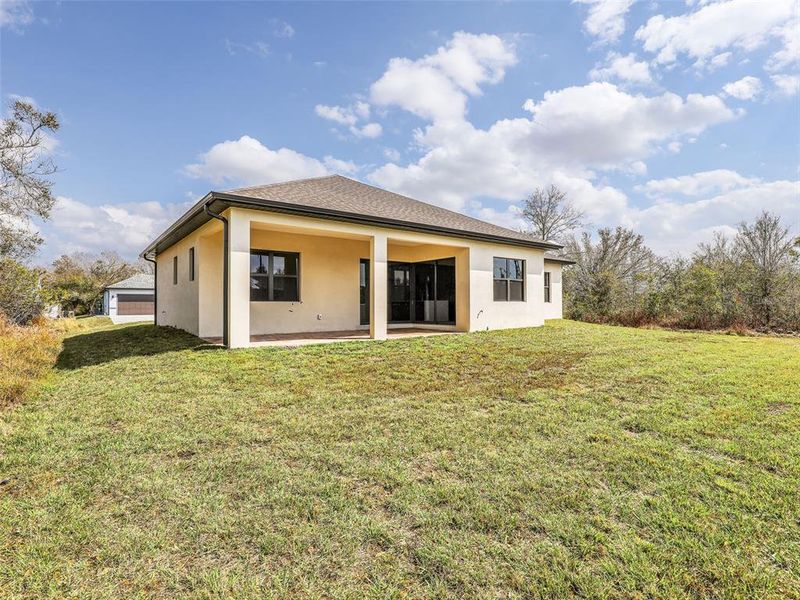Exterior details and patio area of a home in , Port Charlotte (Image 27).