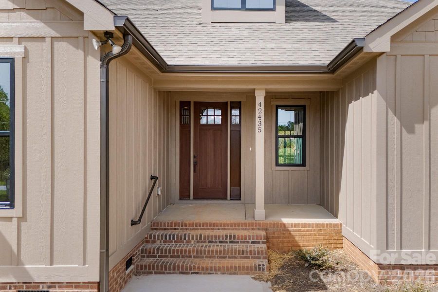 Exterior details and patio area of a home in , Norwood (Image 3).