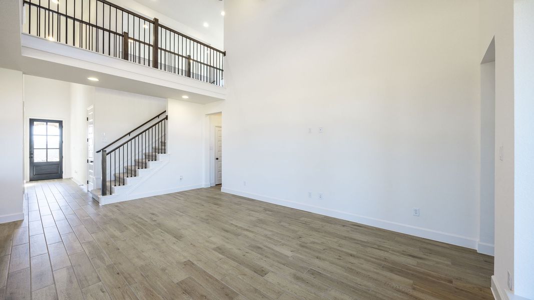 Spacious, unfurnished interior of a new home in The Colony, Bastrop (Image 5).