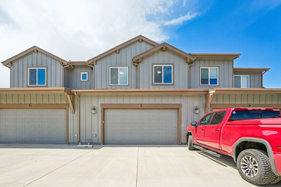 Front exterior of a new home in Vernazza, Windsor, CO, highlighting curb appeal (Image 2). Front exterior of a new home in Vernazza, Windsor, CO, highlighting curb appeal (Image 2).