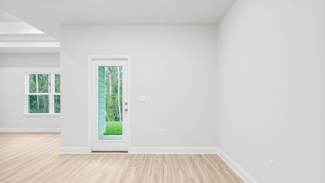 Representative unfurnished interior of a home built from the The Rhett by D.R. Horton in Pine Creek and Heron Walk, Port St. Joe (Image 30).