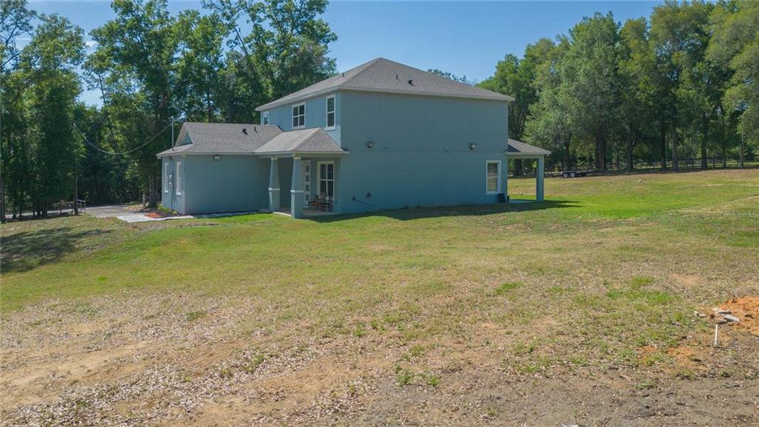 Exterior details and patio area of a home in , Dade City (Image 31).