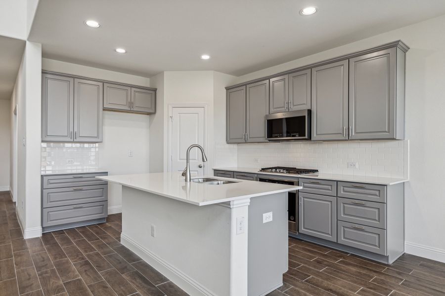 Representative furnished interior of a home built from the Isabella by Megatel Homes in Sicily, Princeton (Image 5).