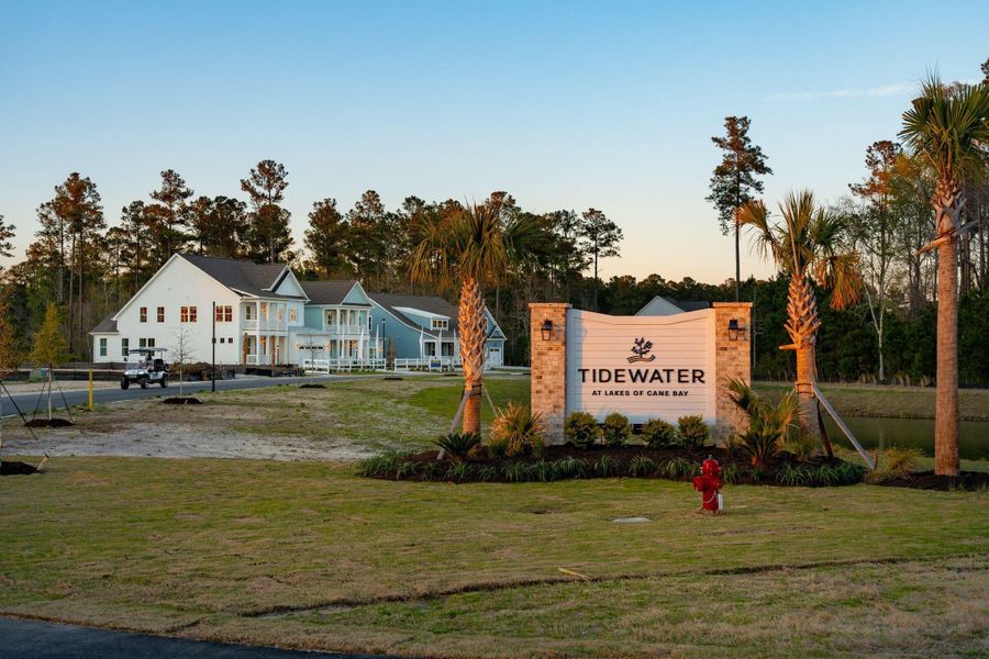Front exterior of a new home in Tidewater at Lakes of Cane Bay, Summerville, SC, highlighting curb appeal (Image 1).