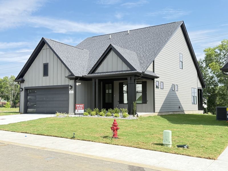 Front exterior of a new home in Ridgecrest at Whites Creek, Whites Creek, TN, highlighting curb appeal (Image 2). Front exterior of a new home in Ridgecrest at Whites Creek, Whites Creek, TN, highlighting curb appeal (Image 2).