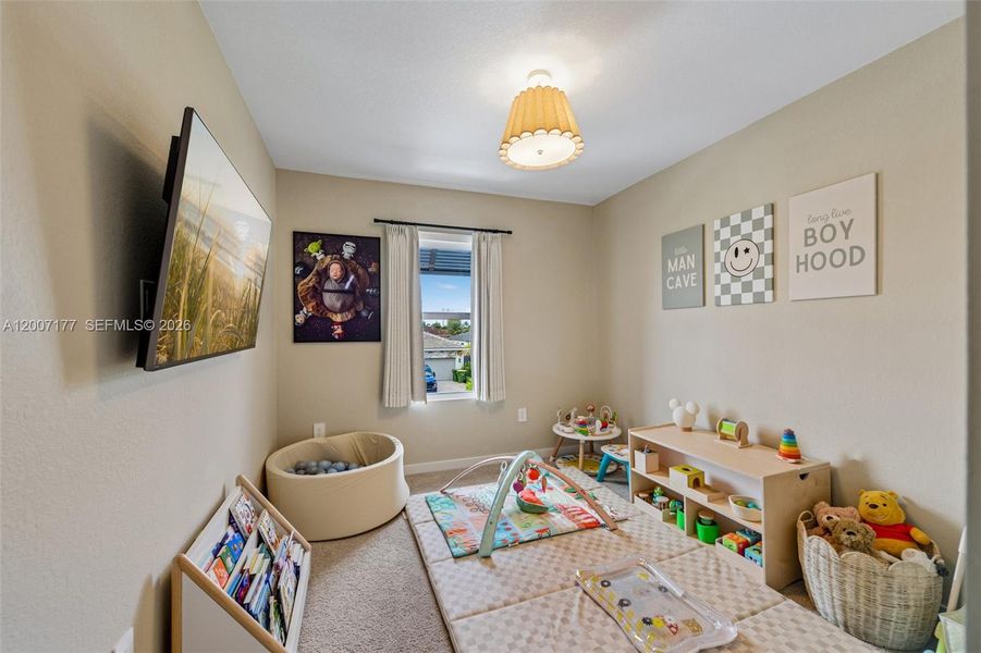 Furnished interior view inside a new home in Messina Place, Homestead (Image 40).
