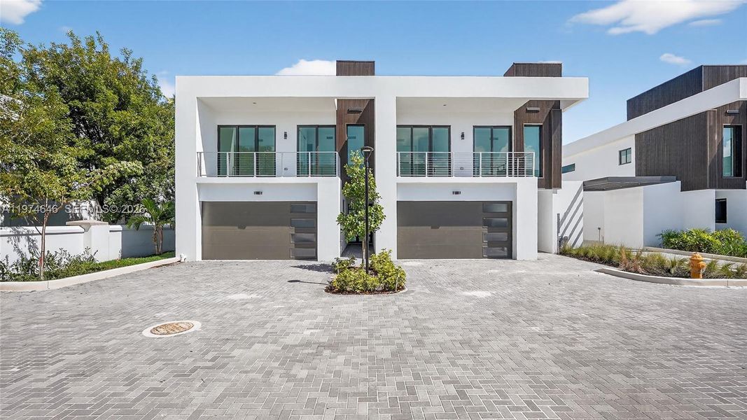 Front exterior of a new home in , Dania Beach, FL, highlighting curb appeal (Image 31).