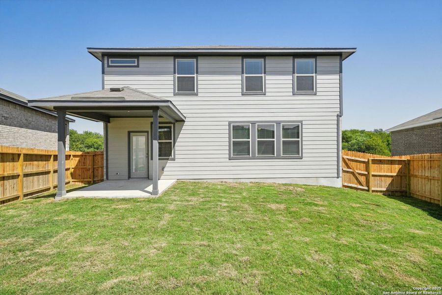 Front exterior of a new home in Comanche Ridge, San Antonio, TX, highlighting curb appeal (Image 21). Front exterior of a new home in Comanche Ridge, San Antonio, TX, highlighting curb appeal (Image 21).