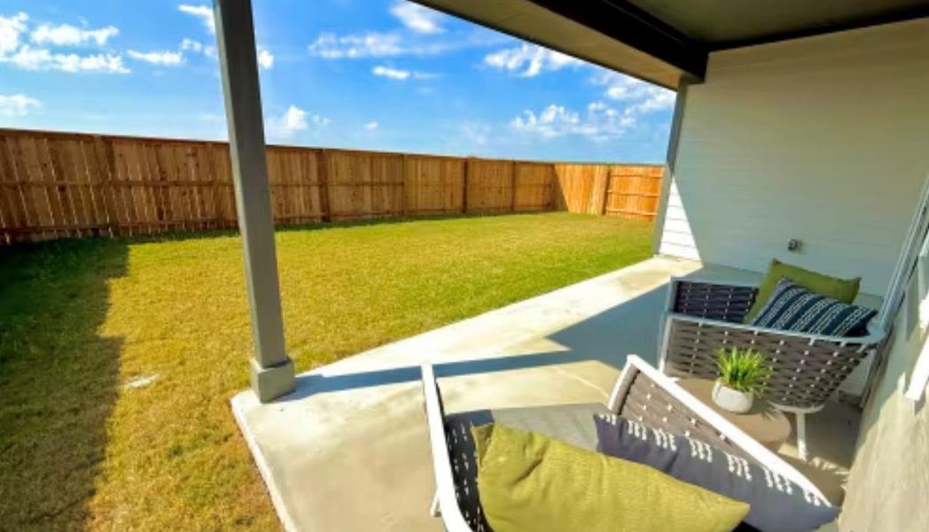 Exterior details and patio area of a home in Sage Collection – Freedom at Anthem, Kyle (Image 2).