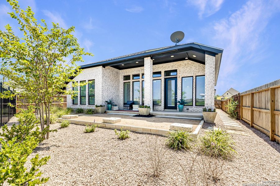 Front exterior of a new home in , Bulverde, TX, highlighting curb appeal (Image 2). Front exterior of a new home in , Bulverde, TX, highlighting curb appeal (Image 2).