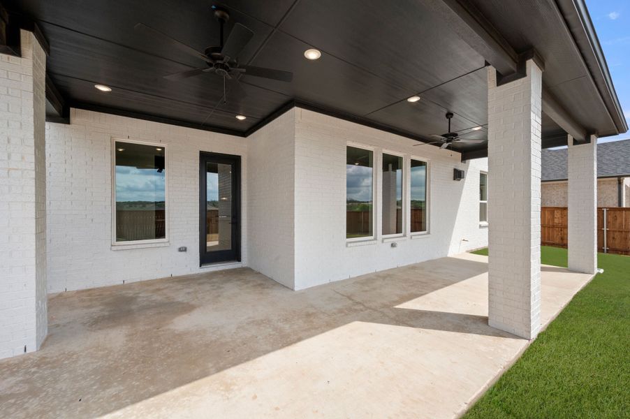 Representative exterior photo of a completed home built from the Aspen by Stonefield Homes in Rio Vista at Kelly Ranch, Aledo, TX (Image 23).