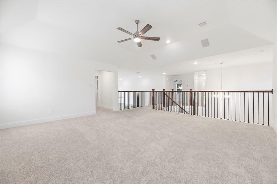 Versatile upstairs game room.