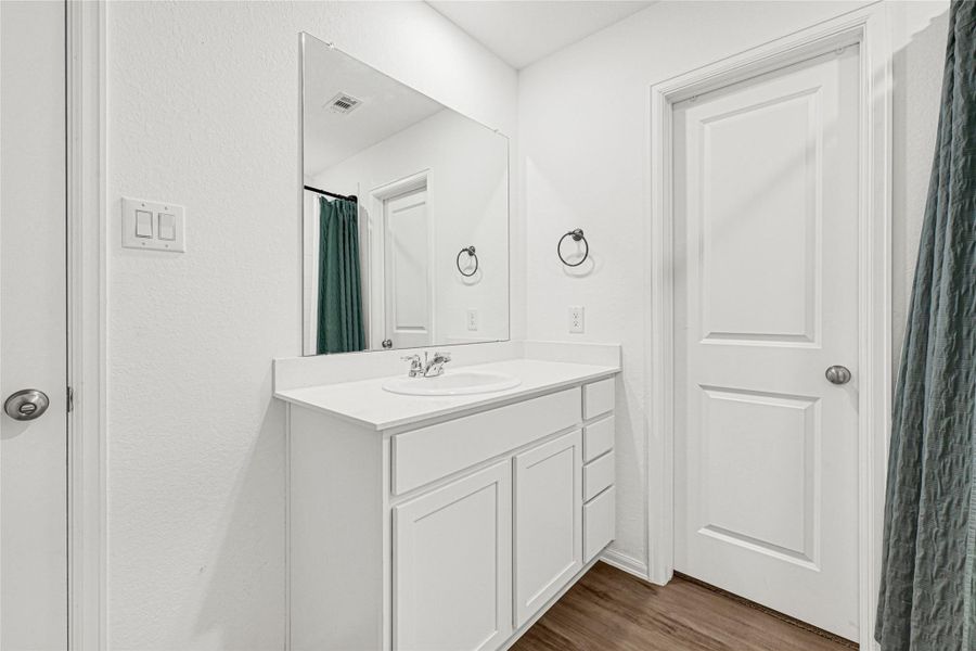 Furnished interior view inside a new home in Townsend Reserve: Cottage Collection, Splendora (Image 11). Furnished interior view inside a new home in Townsend Reserve: Cottage Collection, Splendora (Image 11).