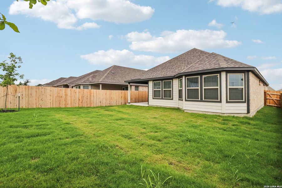 Exterior details and patio area of a home in Kallison Ranch, San Antonio (Image 29).