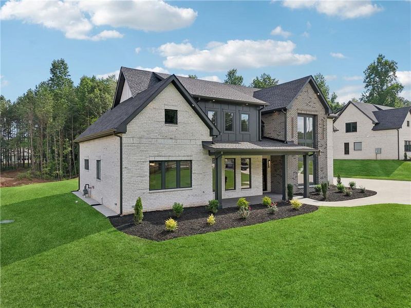Front exterior of a new home in , Braselton, GA, highlighting curb appeal (Image 30).