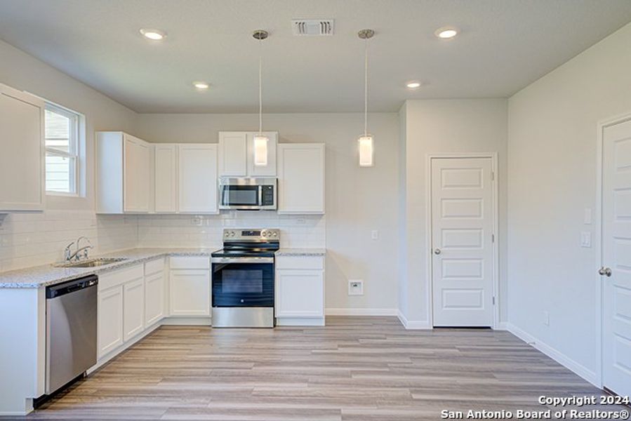 Furnished interior view inside a new home in Blue Ridge Ranch, San Antonio (Image 4).