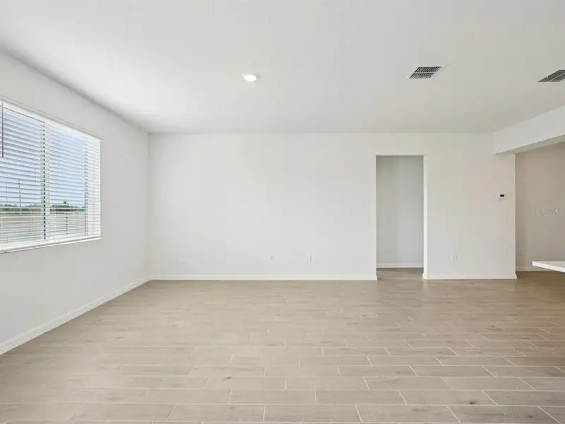 Spacious, unfurnished interior of a new home in Oakfield Trails - Classic Series, Parrish (Image 10).