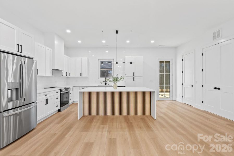 Furnished interior view inside a new home in , Fletcher (Image 6).