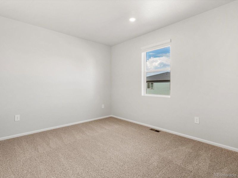 Spacious, unfurnished interior of a new home in Poudre Heights: The Alpine Collection, Windsor (Image 14).