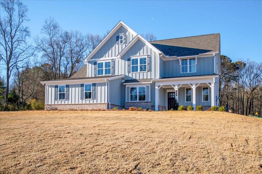 Front exterior of a new home in Autumn Brook, Canton, GA, highlighting curb appeal (Image 25).