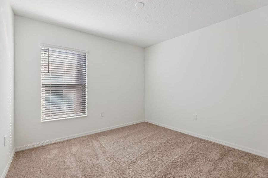 Spacious, unfurnished interior of a new home in Robins Run, Lake Wales (Image 22).