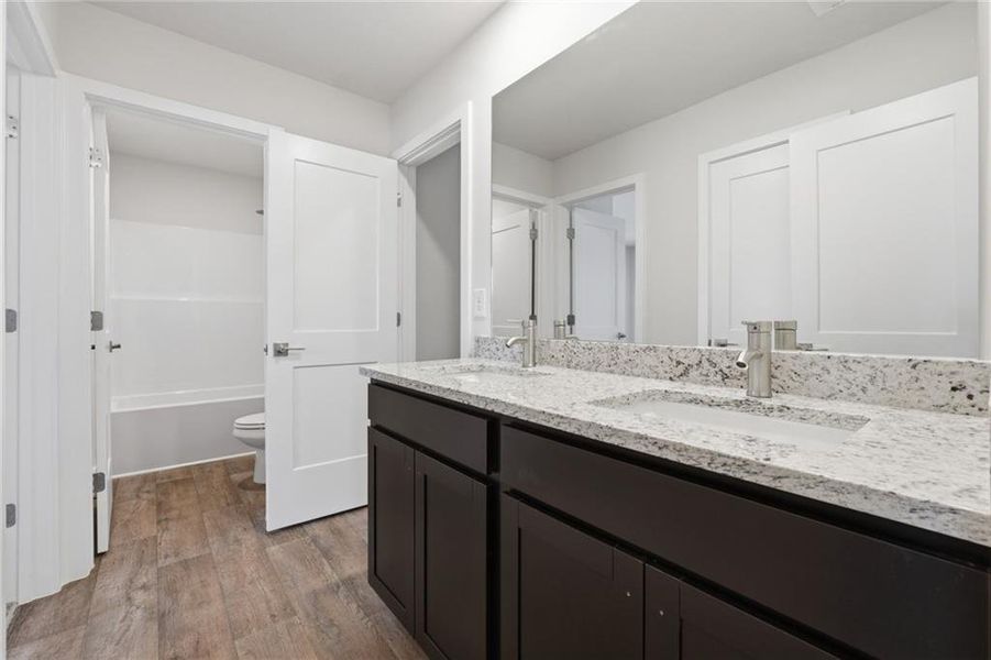 Furnished interior view inside a new home in Fern Dale, Fairburn (Image 11).