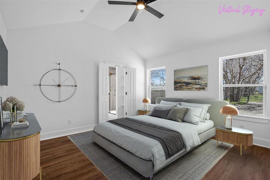 Bedroom with vaulted ceiling, multiple windows, baseboards, and dark wood-style flooring