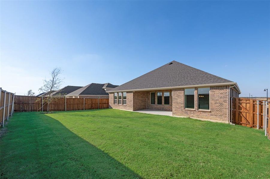Exterior details and patio area of a home in Arbors at Legacy Hills, Celina (Image 3).