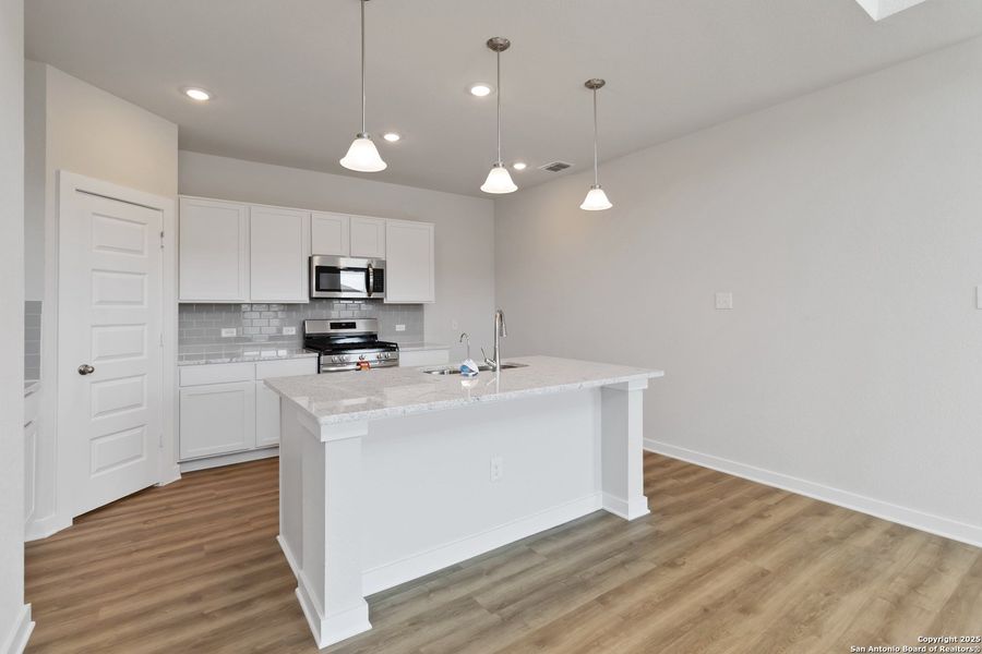Furnished interior view inside a new home in Hickory Ridge, Elmendorf (Image 12).