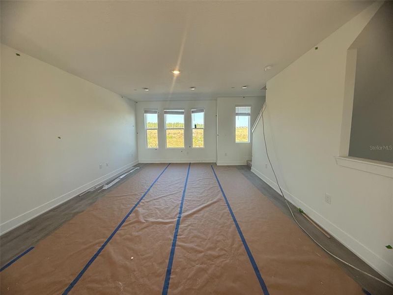 In-progress construction of a new home in Parkview at Hamlin, Winter Garden, FL (Image 23).