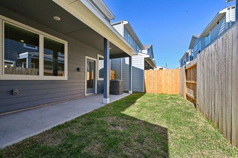 Exterior details and patio area of a home in Kemah Crossing - City Series, Kemah (Image 24). Exterior details and patio area of a home in Kemah Crossing - City Series, Kemah (Image 24).