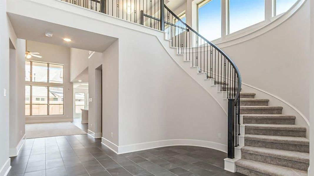 Spacious, unfurnished interior of a new home in Sunterra, Katy (Image 19).