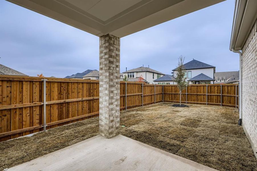 Exterior details and patio area of a home in Mosaic 40s, Celina (Image 21).