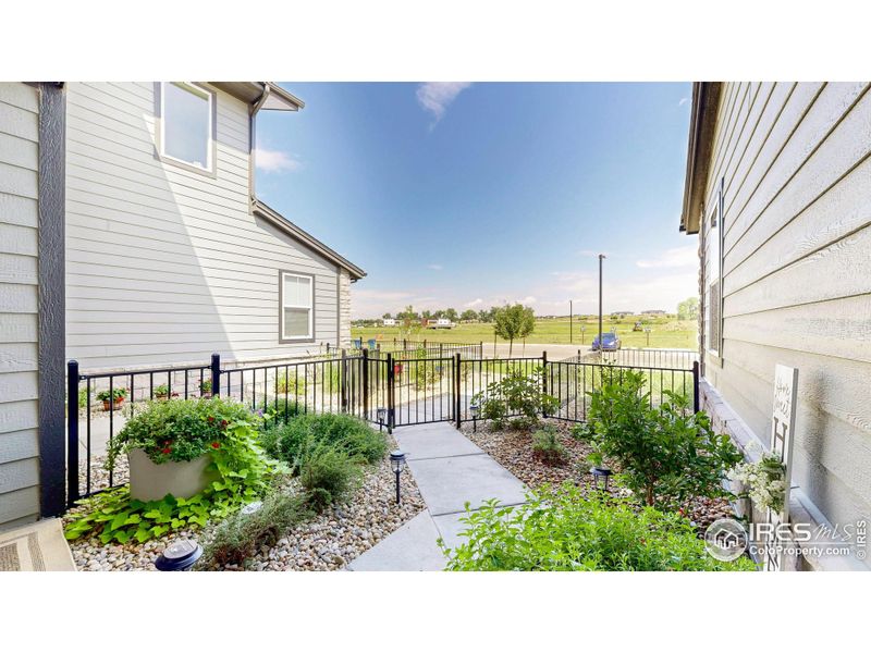 Gated front patio and walkway