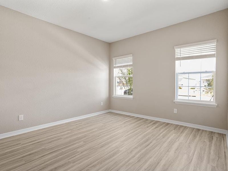 A downstairs den provides desirable flex-use space. A downstairs den provides desirable flex-use space.