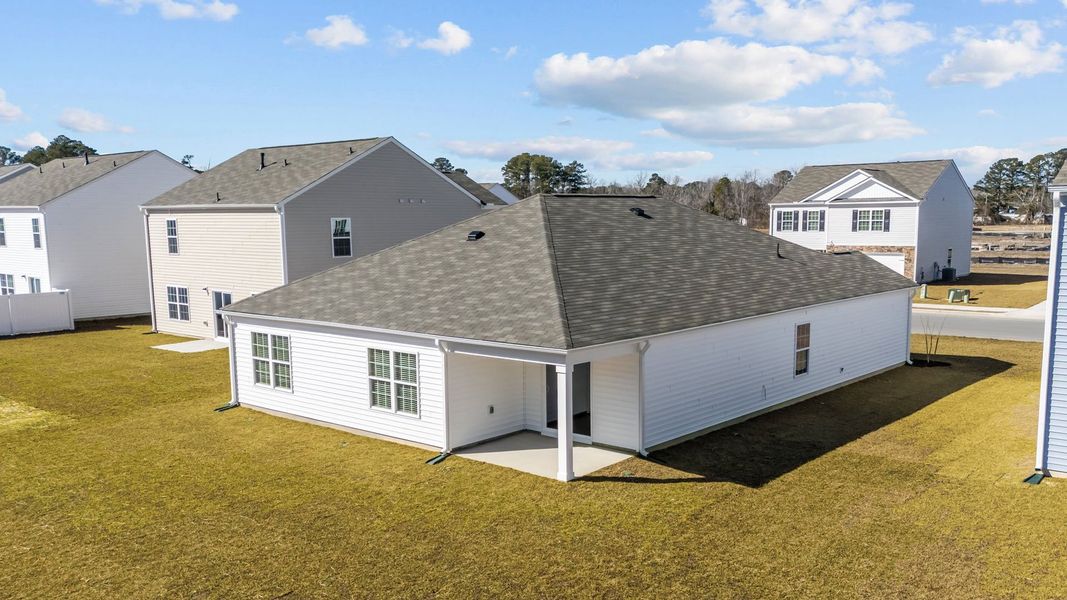 Exterior details and patio area of a home in Madeline Farm, New Bern (Image 3).