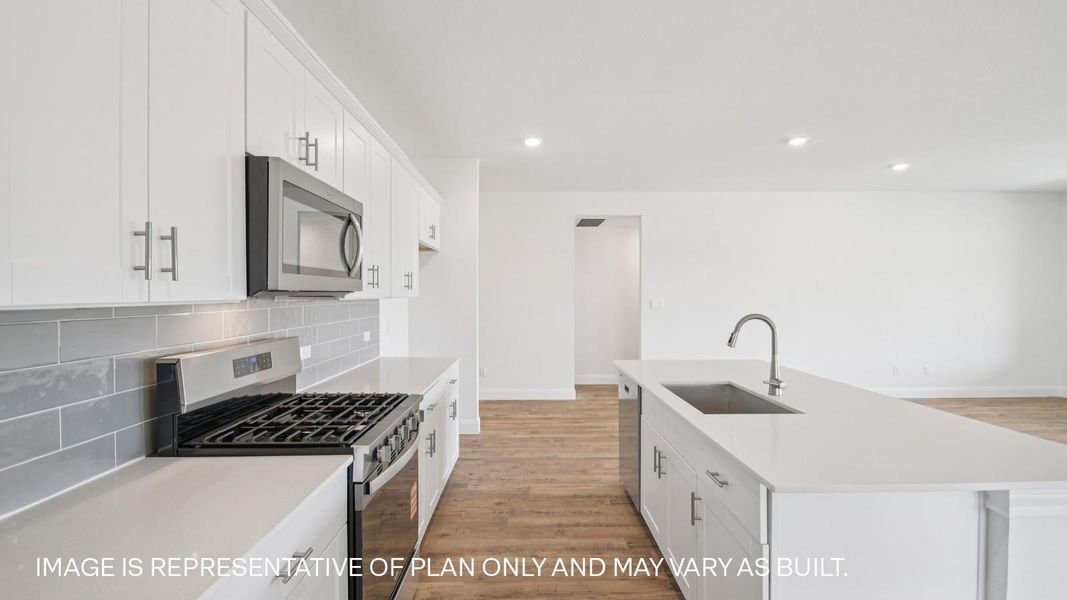 Representative furnished interior of a home built from the The Westley by D.R. Horton in Railhead, Cedar Creek (Image 6).