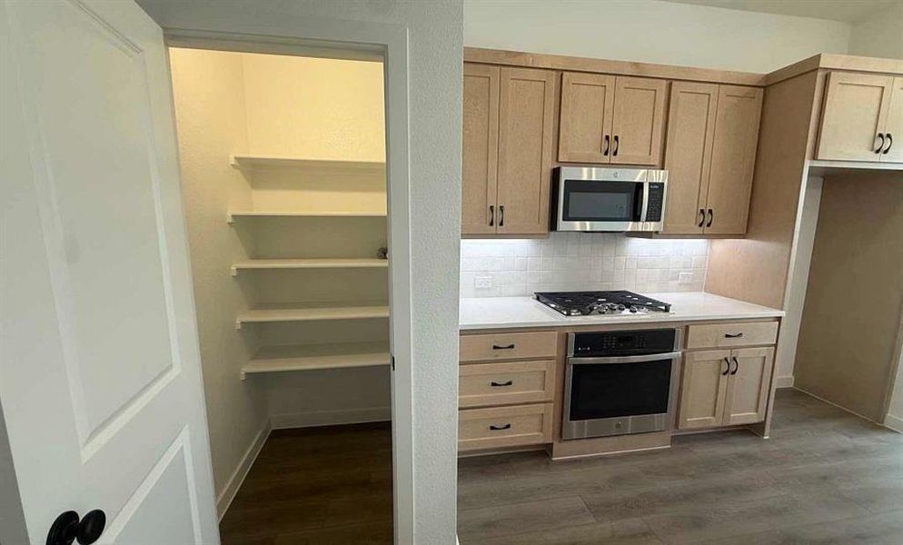 Furnished interior view inside a new home in Collin Creek, Plano (Image 3).