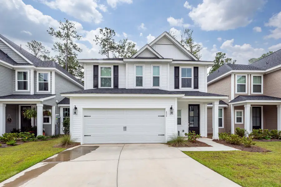Front exterior of a new home in Hampton Woods, Summerville, SC, highlighting curb appeal (Image 1). Front exterior of a new home in Hampton Woods, Summerville, SC, highlighting curb appeal (Image 1).