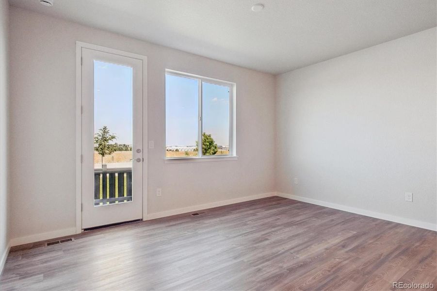 Spacious, unfurnished interior of a new home in Paired Homes at Alder Creek, Parker (Image 20).