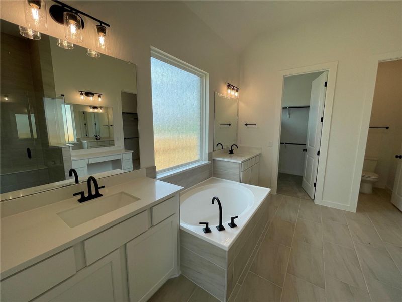 Primary Bath retreat with dual vanities & garden tub Primary Bath retreat with dual vanities & garden tub